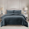 Simon Baker Brooklyn jacquard comforter set with plush sherpa fleece lining on a styled bed in colour Charcoal