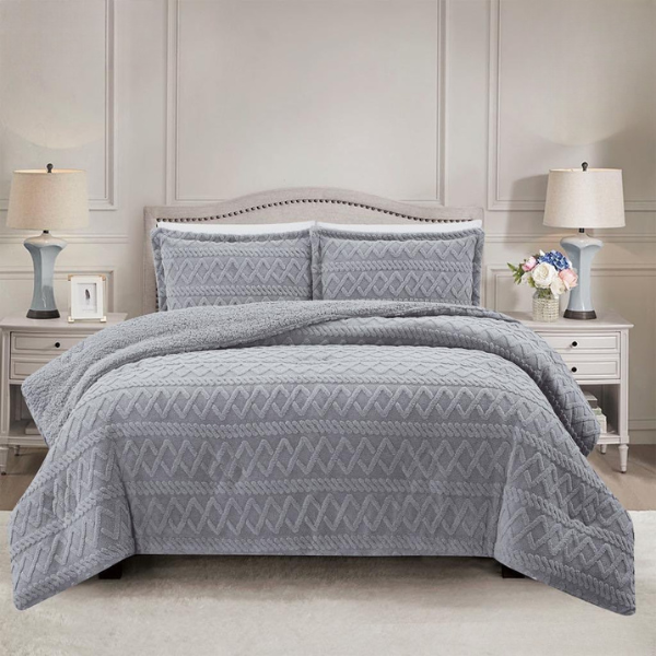 Simon Baker Brooklyn jacquard comforter set with plush sherpa fleece lining on a styled bed in colour Platinum
